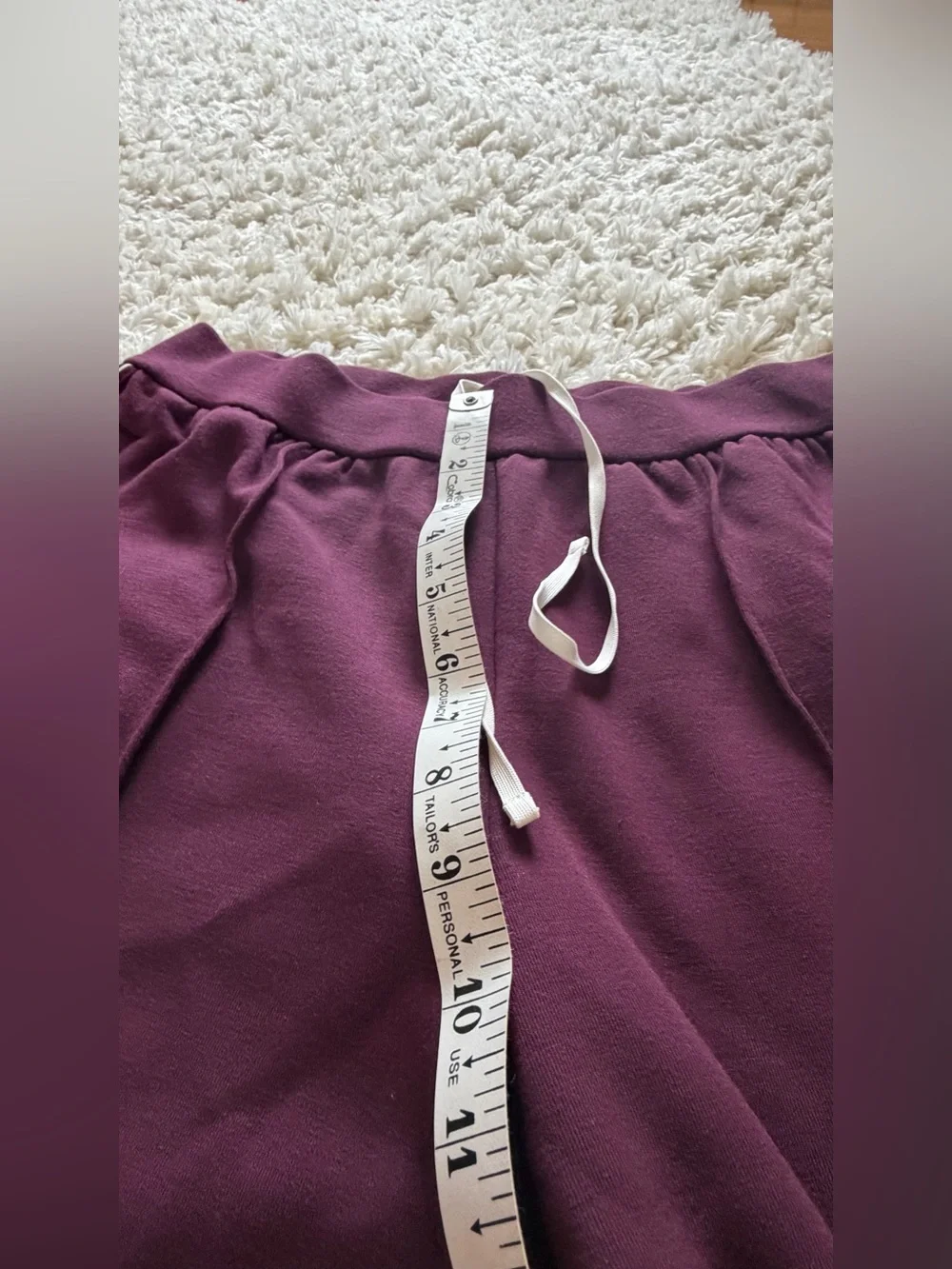 ALO Yoga Wide-Leg Track Pants in Plum with White Side Stripes - Picture 6 of 10